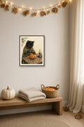 A Little October Magic: a black cat in a cardigan carving a jack-o’-lantern by candlelight, framed print on an autumn wall