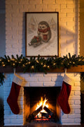 Bringing Home the Tree: a hedgehog in a red scarf pulling a sled with a small pine tree through a snowy village, framed print in a cozy room